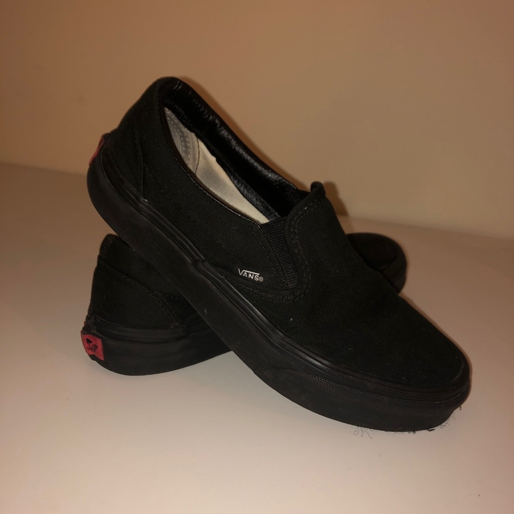 all black vans slip ons